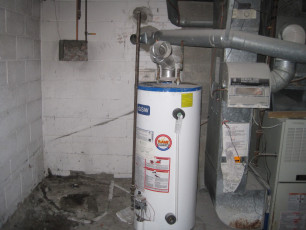 Hot water tank replacement and relocation;