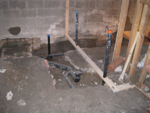 washroom drain pipes in basement