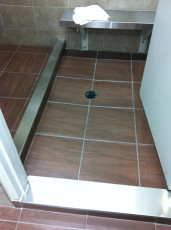 Complete Renovated industrial washroom_ Tiling wasroom shower,  washroom floor, faucet, spout and drain plumbing_ 2