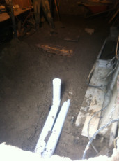 Plumbing basement drain pipes
