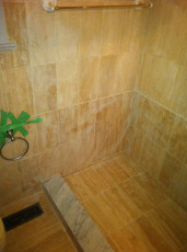 Tiling wasroom shoer,  washroom floor, faucet, spout and drain plumbing;